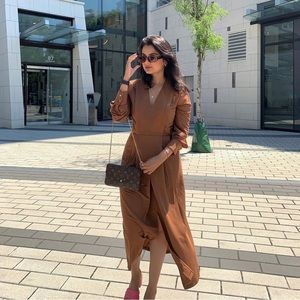 Mango brown long sleeved dress w/ small slit in the front. Size 6